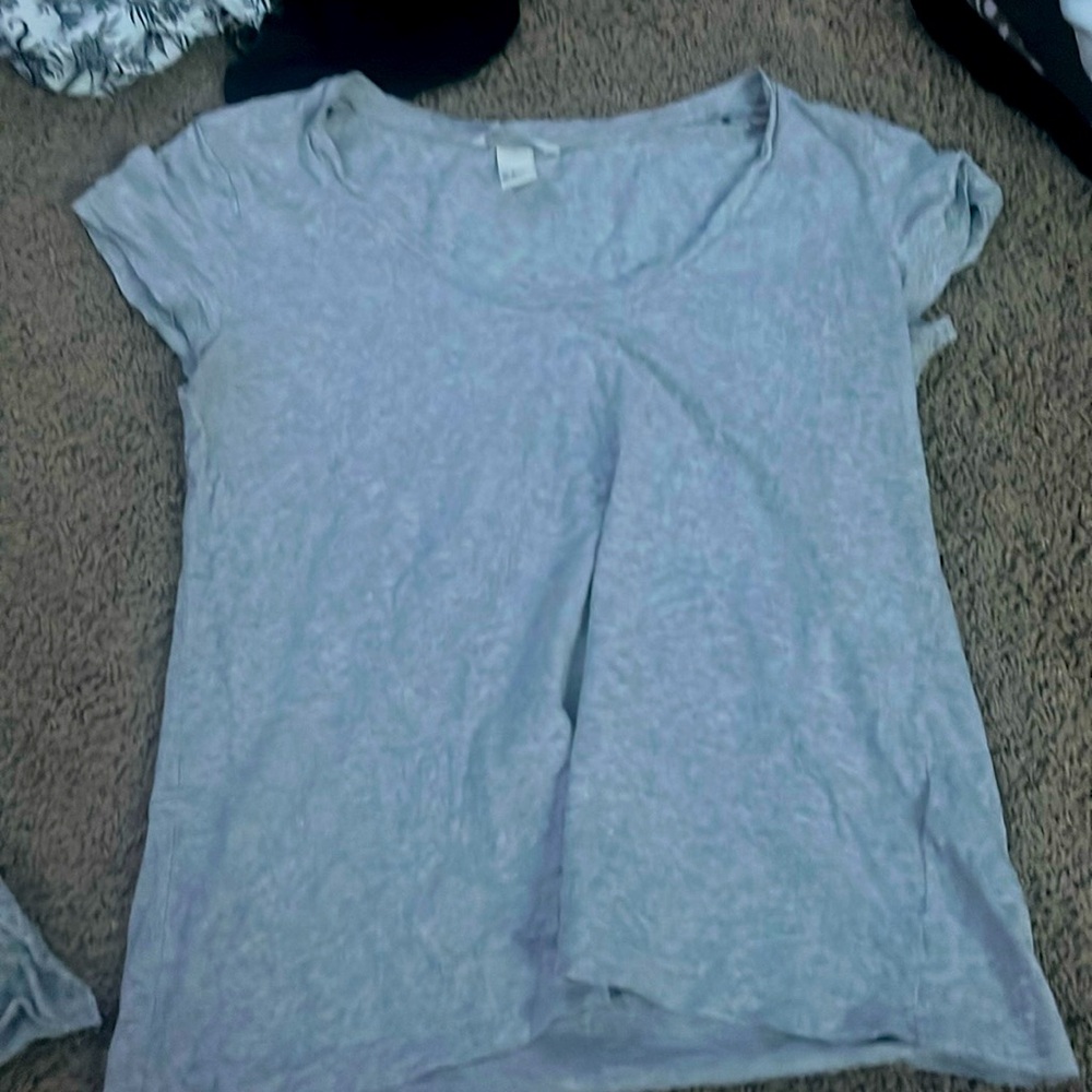 Gray swoop neck short sleeve shirt.